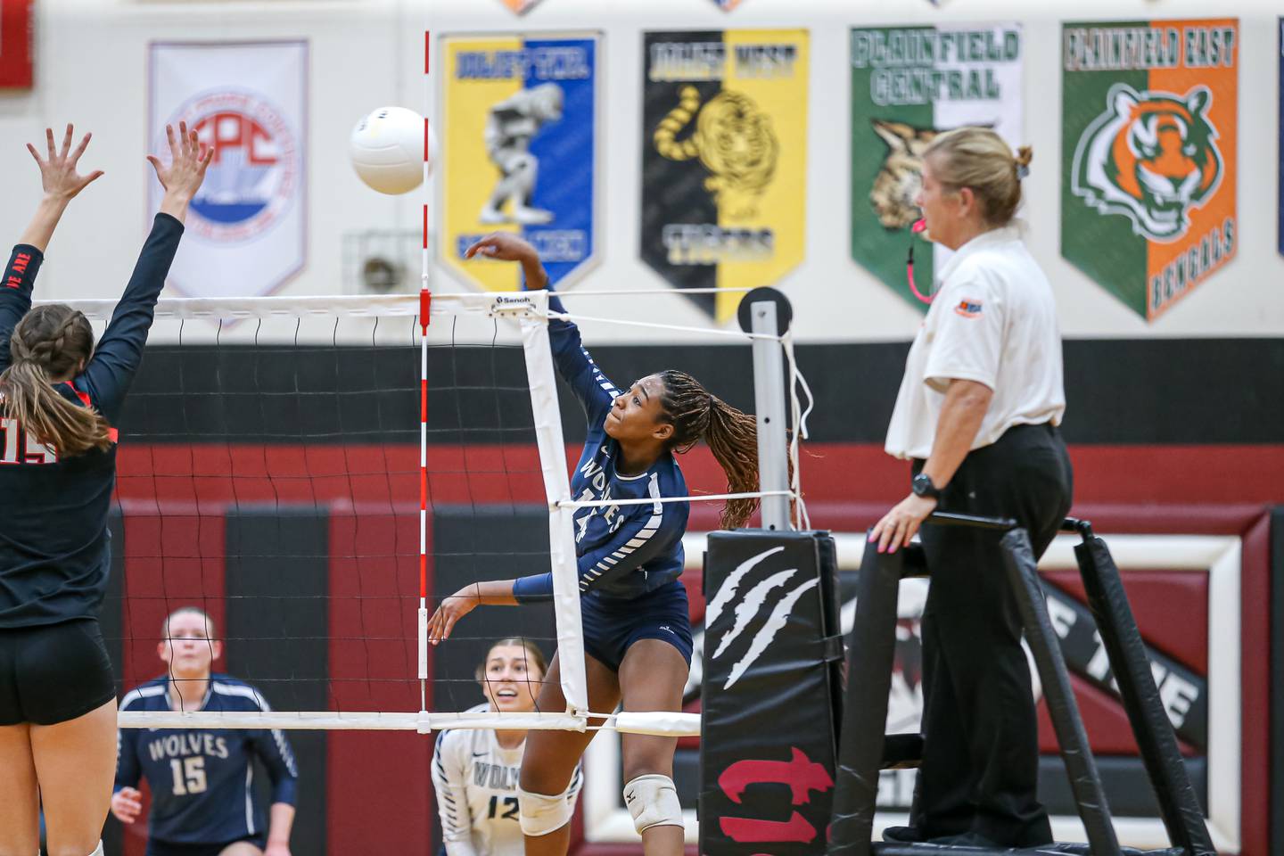 Oswego East's Cailyn Smiley (14) with a spike during Class 4A Plainfield North Sectional semifinal match between Oswego East at Benet. Oct 31, 2022.