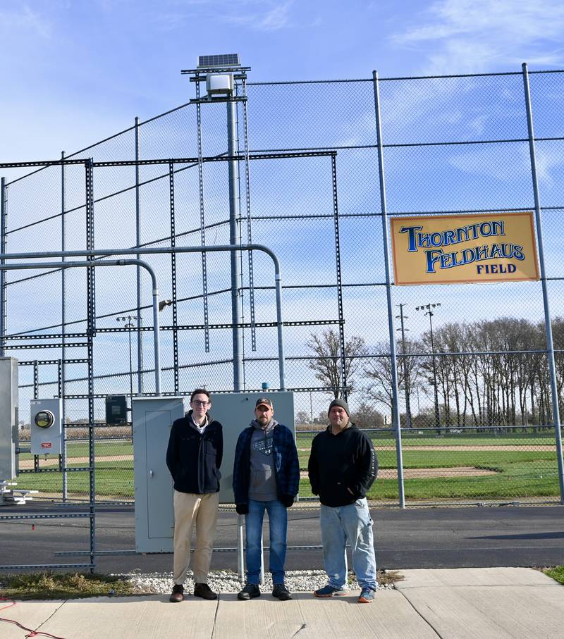 Public Information Officer Brent Bader, Alderman Joe Jeppson and Public Works Supervisor Patrick Watson stand below the air monitor provided to the city of La Salle in July by Carus LLC at Rotary Park on Thursday.