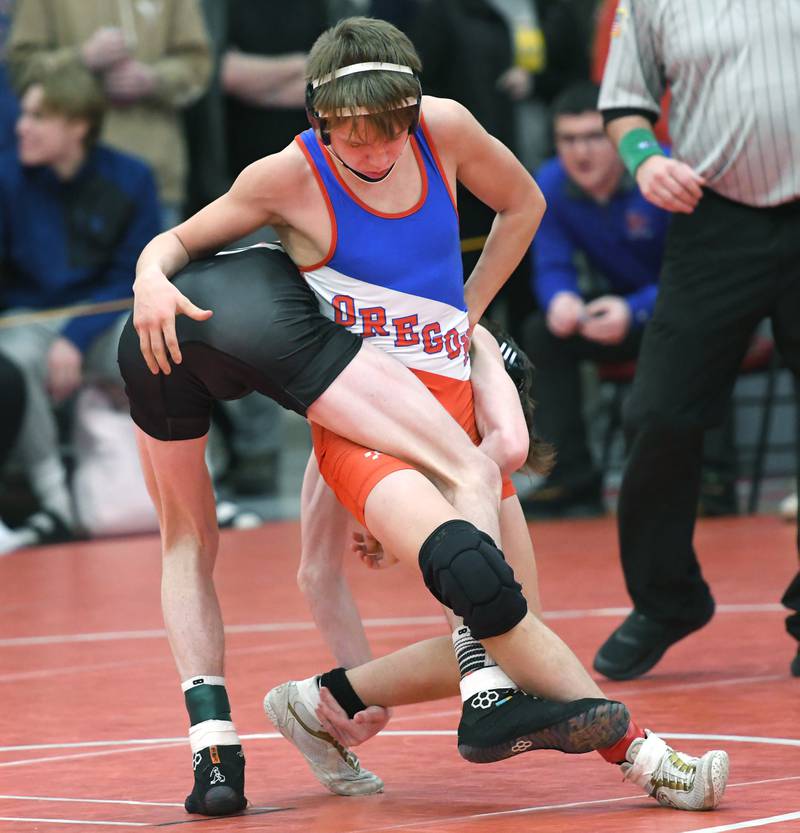 Oregon's Preston LeBay tries to break free from Orion's Luke Moen in their 120-pound match at the 1A Oregon Wrestling Sectional on Friday night.