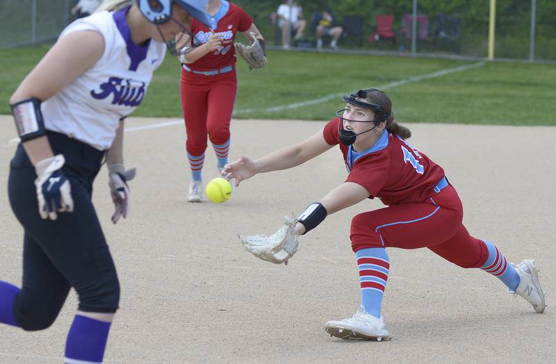 Ottawa starting pitcher Addie Russell, leaves the mound to field a ground ball Wednesday against Rochelle at Ottawa.