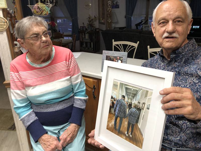 Barb, left, and Ron Kurpiers of Crystal Lake, married in June 2017, when Barb was 83 and Ron was 82. The couple, seen here on Sunday, Feb. 9, had their photo taken and shared with them while on an outing to The Dole.