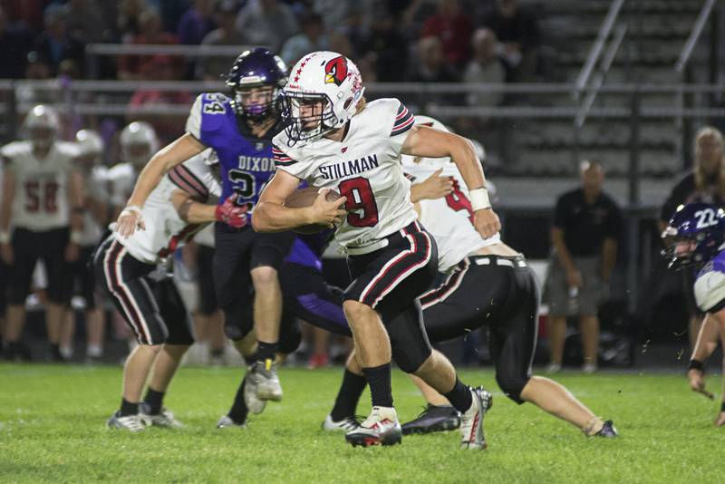 Stillman Valley’s Owen Zitkus picks up yards against Dixon Friday, Sept. 16, 2022.