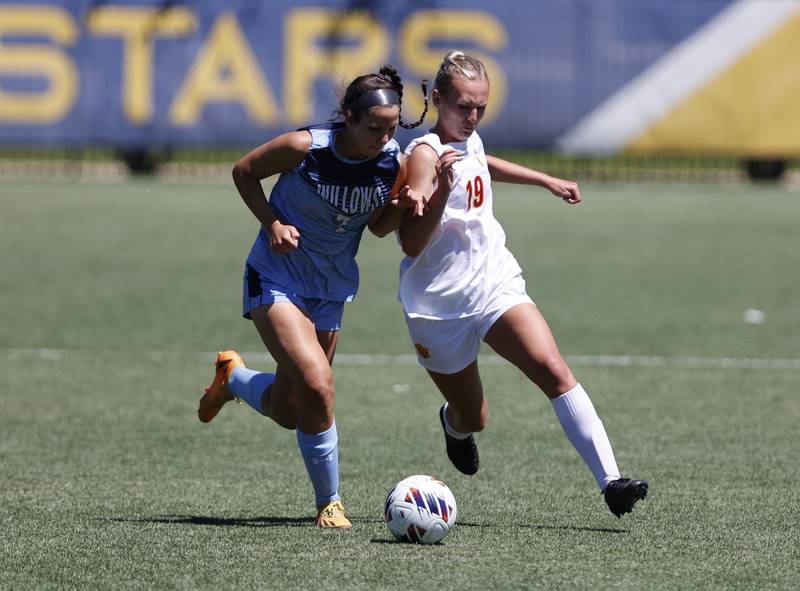 Willows' Erin Mongoven (7) fights for the ball against Richmond-Burton's Layne Frericks (19) during the Class 1A Dominican super-sectional between Willows Academy and Richmond-Burton HS in River Forest on Saturday, May 25, 2024.