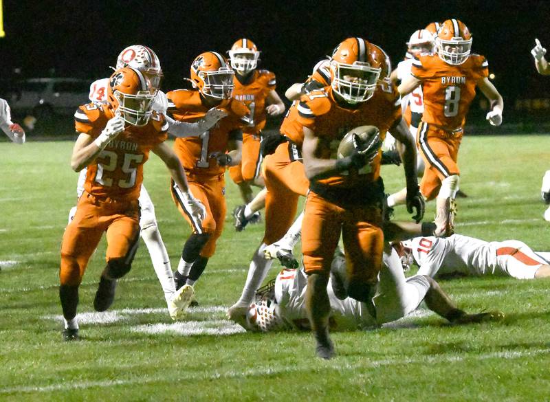 Byron's JJ Edmonson (27) runs to the end zone after grabbing a kick off on the bounce against Oregon on Friday, Oct. 31, 2025 in the first round of the 3A state playoffs held at the Everett Stine Stadium in Byron.