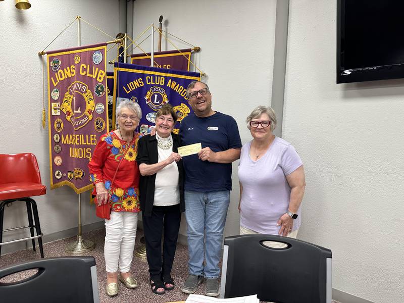 The Marseilles Lions Club donated $5,831 to the Seattle Sutton Marseilles Museum. Pictured in the donation photo are Rosemary Martin (Seattle Sutton Marseilles Museum volunteer manager), Seattle Sutton, Brock Martin (president of Marseilles Lions Club) and Patty Jo Smith (Museum director).