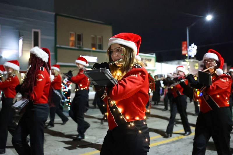 Bradley-Bourbonnais Community High School band member Olivia Bray performs a holiday tune during the 40th annual Bradley Christmas Parade on Friday, Dec. 5, 2025.