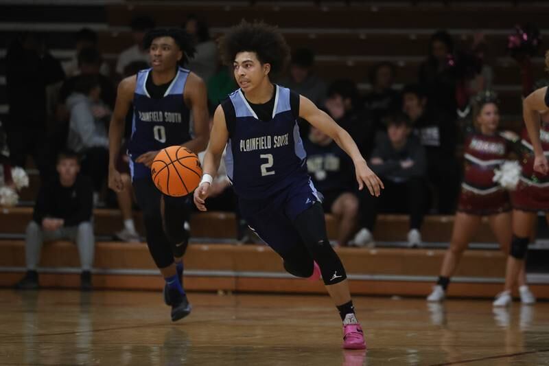 Plainfield South’s Corey Nobles works the ball upcourt against Morris on Wednesday, Jan 29, 2025 in Morris.