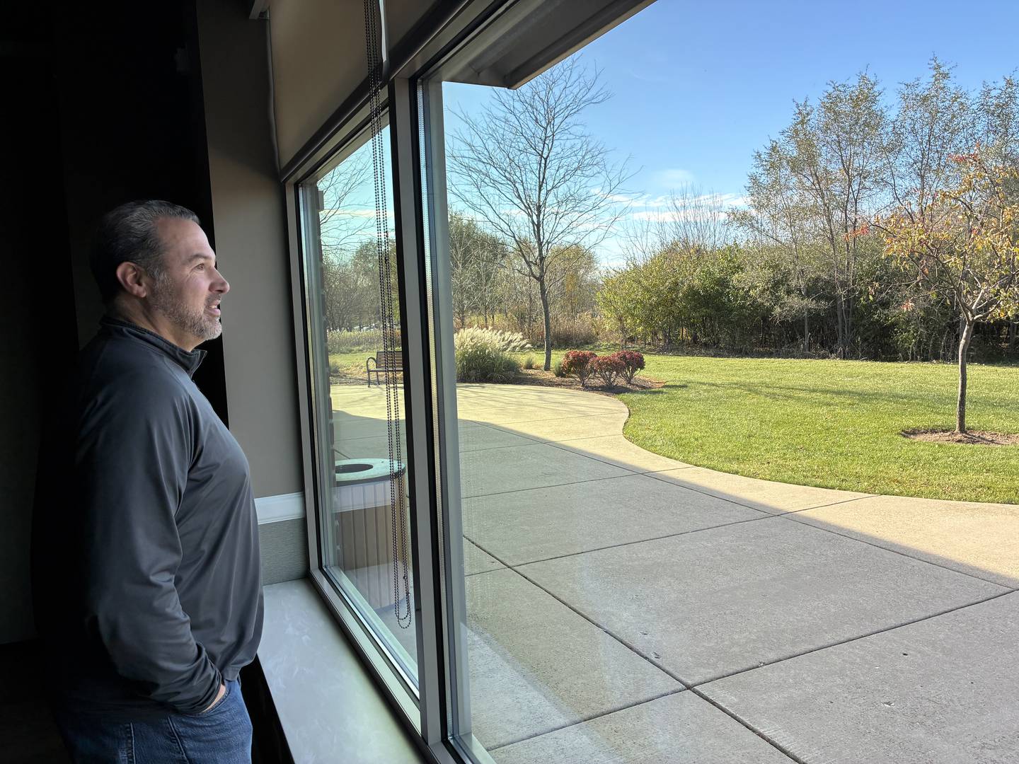 Parks and Recreation Director Bill Hobson looks out from the Recreation Center's west-facing windows on Thursday, Nov. 13, 2025. If the city were to rebuild its outdoor pool facilities, this would be the likely location.