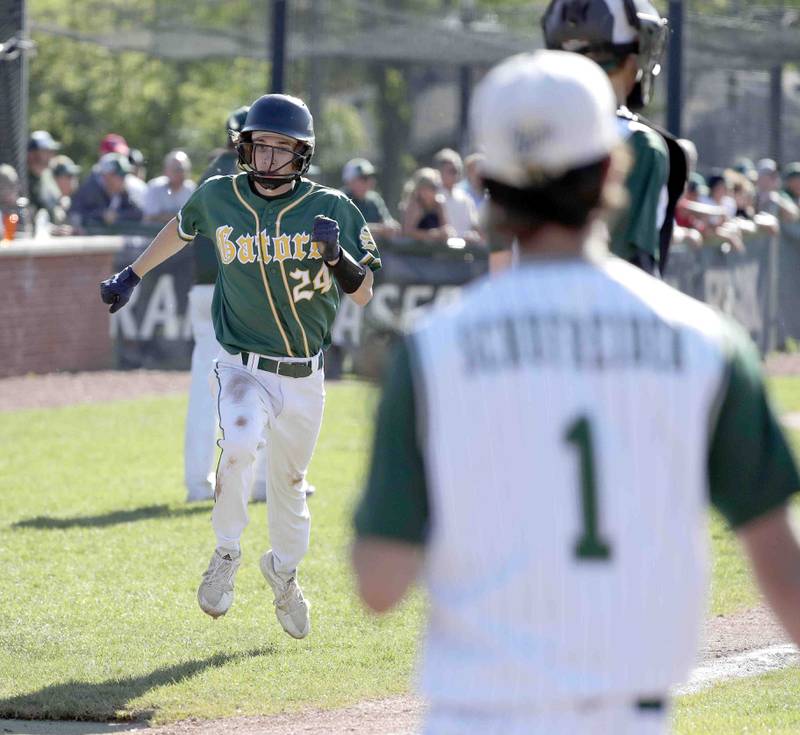 Crystal Lake South's Mason Struck heads in for the only run of the game during the IHSA Class 3A sectional semifinals, Thursday, June 2, 2022 in Grayslake.