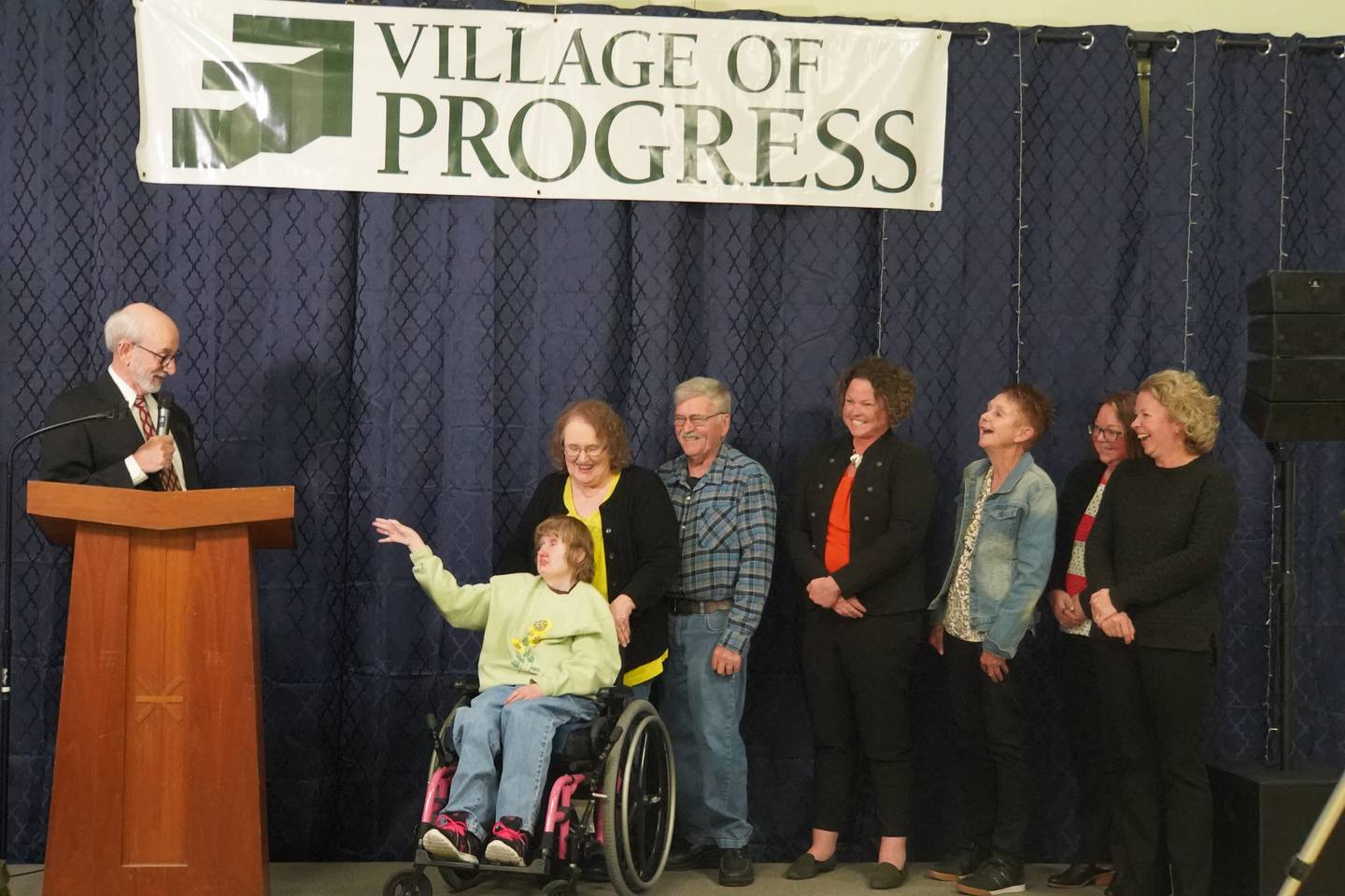 Sherri Drew received the Robert Stahl Friendship Award at the Village of Progress Annual Banquet on Wednesday, Oct. 22, 2025 in Oregon. At left is Master of Ceremonies Tom Wadsworth.