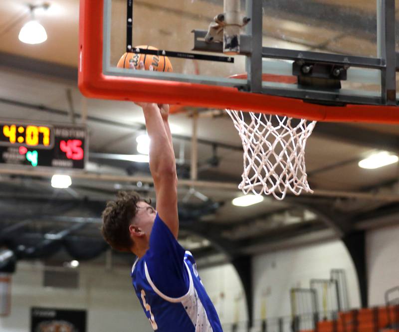 Woodstock's Max Beard dunks the basketball during a nonconference boys basketball game against Crystal Lake Central on Monday Jan. 5,  2026, at Crystal Lake Central School.