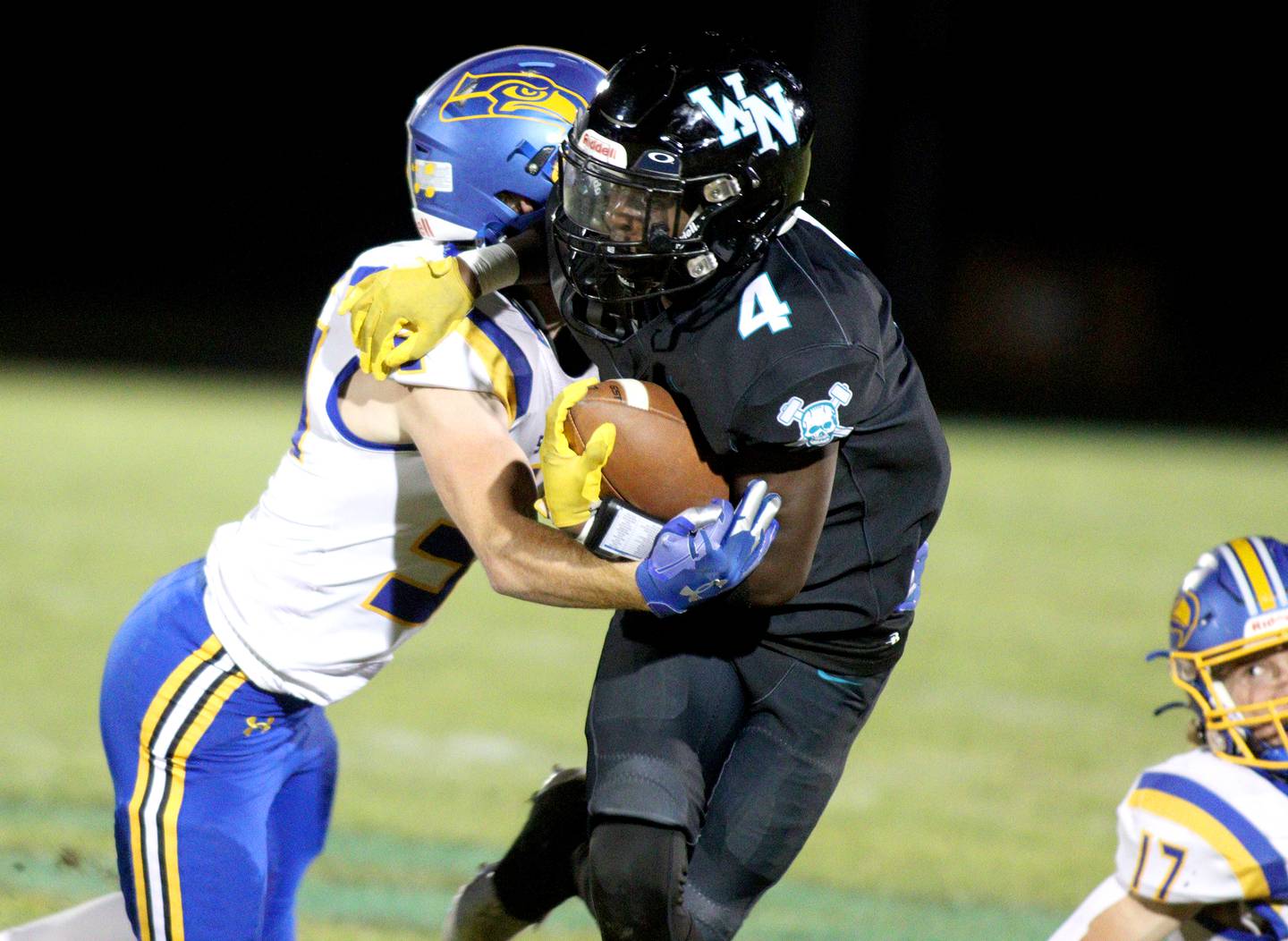 Woodstock North’s Sean Mitchell runs the ball against Johnsburg in varsity football on Friday Sept. 27, 2024, at Woodstock North High School in Woodstock.