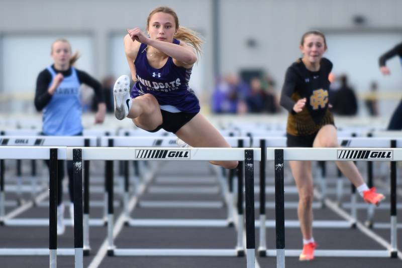 Wilmington's McKenna Van Tilburg leads the pack to the finish line of the 100 hurdles at the Herscher Invite Friday, May 1, 2026.