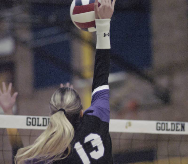 Dixon's Solis Thompson gets the ball past Sterling defenders. Sterling hosted Dixon in Volleyball on August 26, 2025 at Musgrove Fieldhouse.