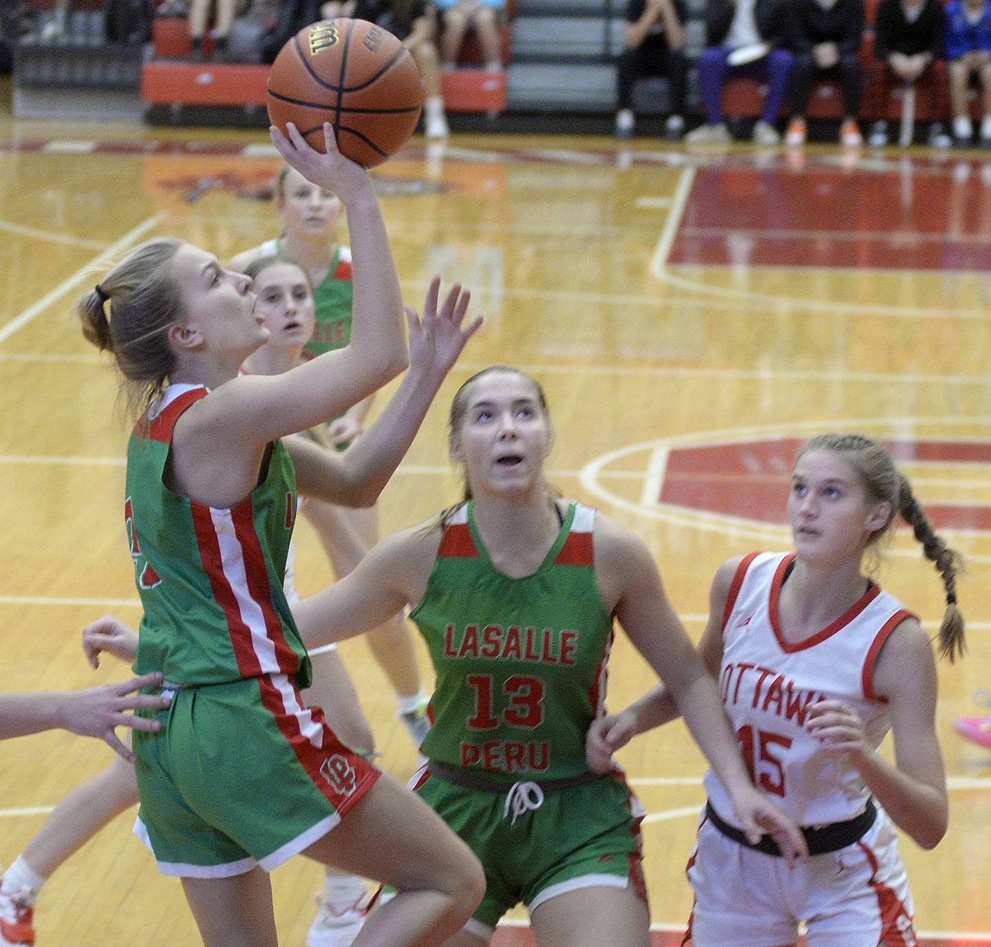 LaSalle Peru’s Kaylee Abens gets a shot away in the 3rd period on Wednesday Dec. 7, 2022 at Kingman Gymnasium in Ottawa