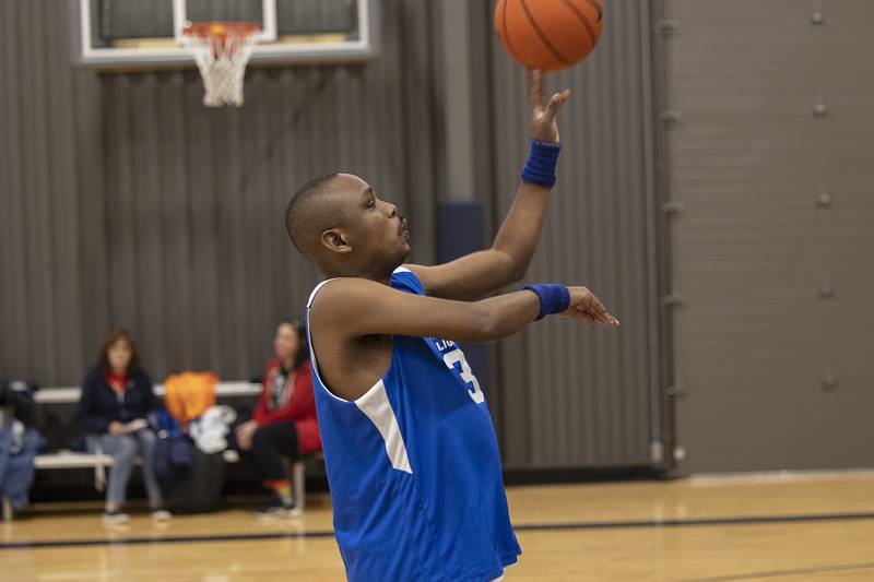 Harold practices his free throws Wednesday, Dec. 18, 2024, with his Mabley Center Special Olympics basketball team. The team will head to a tournament in Byron in January for a chance to compete at the state tournament in March. The team took second last year.