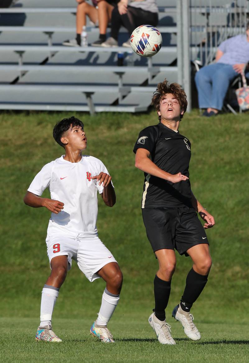 La Salle-Peru's Emir Morales (left) and Sycamore's Will Donahoe look to control the ball during their game Wednesday, Sept. 7, 2022, at Sycamore High School.