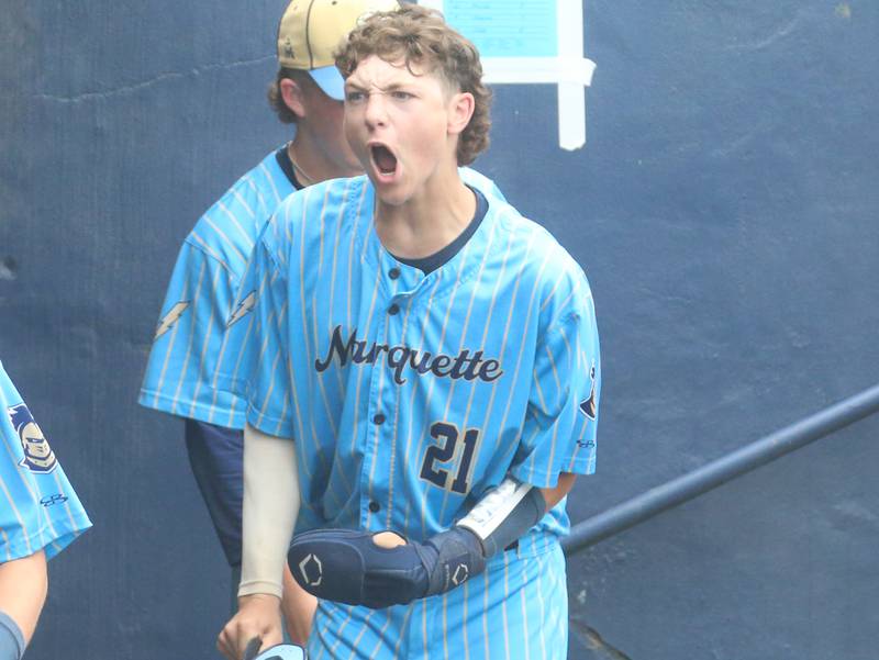 Marquette's Easton Debernadi reacts after scoring a run against Altamont during the Class 1A State championship game on Saturday, June 1, 2024 at Dozer Park in Peoria.