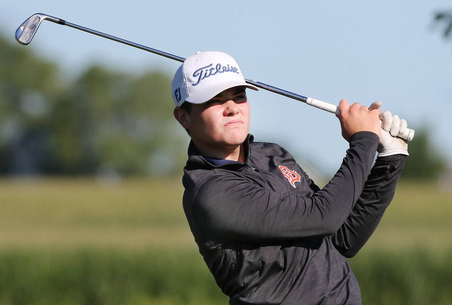 DeKalb's Jonah Keck watches his tee shot on the 4th hole Tuesday, Aug. 9, 2022, during golf practice at River Heights Golf Course in DeKalb.