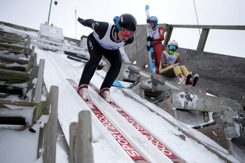 Lucas Nichols jumps while competing in the 116th Norge Annual Winter Ski Jump Tournament at the Norge Ski Club in Fox River Grove, on Sunday, Jan. 31, 2021.