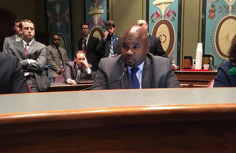 Sen. Elgie Sims, D-Chicago, discusses the proposed budget in a committee hearing in this Wednesday, May 30, 2018 photo, in Springfield, Ill. Sims on Tuesday, Oct. 26, 2021, won Illinois Senate approval of legislation to repeal a 1995 law requiring that a parent or guardian be notified at least 48 hours before a girl younger than 18 undergoes an abortion. The bill now moves to the House with two days left in the Illinois General Assembly's fall session. (AP Photo/John O'Connor)