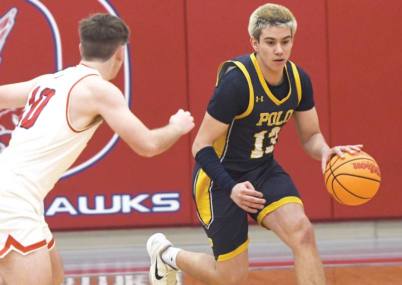 Polo's Eli Perez brings the ball up the court as Oregon's Keaton Salsbury defends during a Friday, Dec. 5, 2025 game at the Blackhawk Center in Oregon.