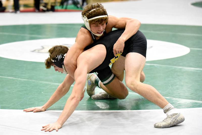 Coal City's Brody Widlowski, top, gets position on Reed-Custer's Jeremy Eggleston during the 138-pound championship at the IHSA Class 1 Coal City Sectional Saturday, Feb. 15, 2025.
