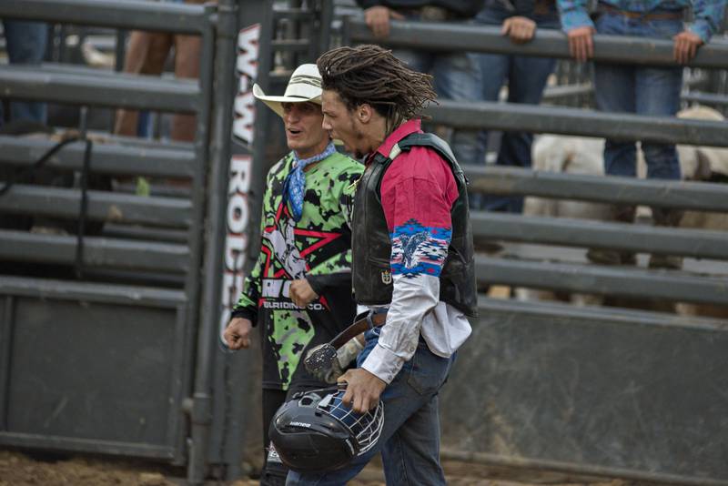 Bull rider Marquis Hunt of Frazier Park, California celebrates his ride Thursday night at the Carroll County Fair.