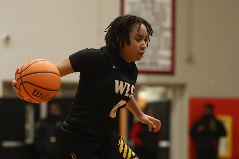 Joliet West’s ReNiyah Cunningham looks to make a move against Bolingbrook on Thursday, Jan 23, 2025 in Bolingbrook.