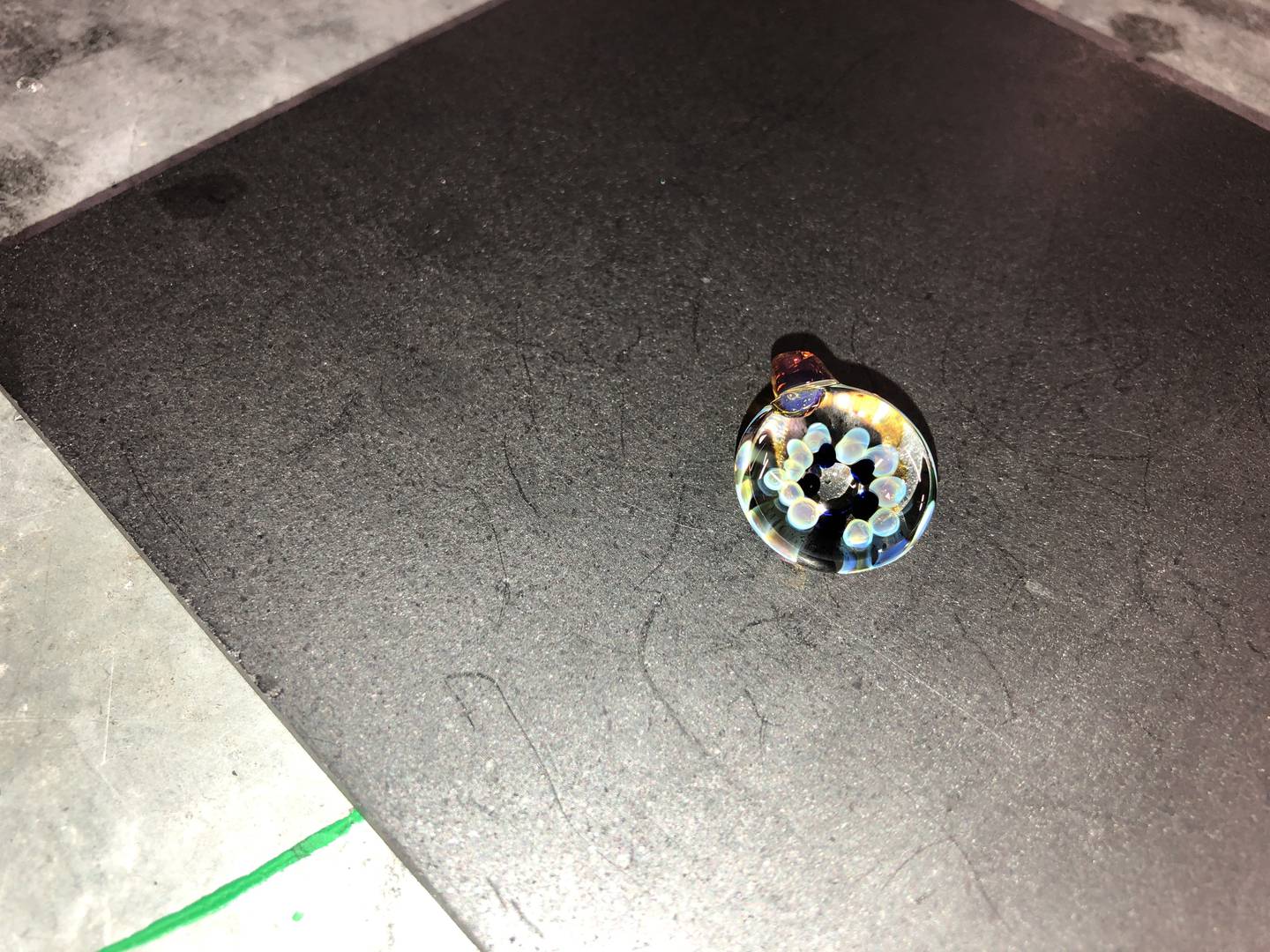 The pendant created by Tom Schodtlur in a one-hour introductory class to glass blowing held July 18, 2022, at Otto’s in McHenry. The class offers pendants, ink dip pens, or ornaments as an option for the first lesson.
