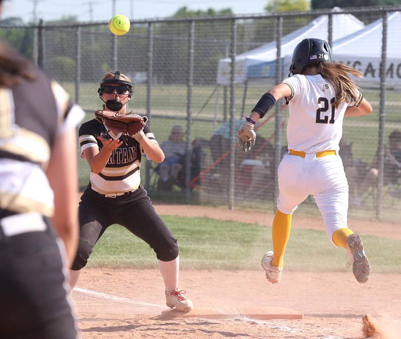 Sycamore's Haley Von Schnase takes the throw at first as Sterling's Katie Taylor beats out a bunt during their Class 3A sectional championship game Friday, June 2, 2023, at Belvidere North High School.