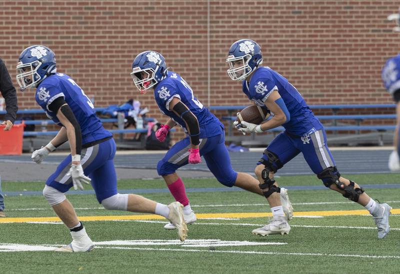 Newman’s Renner Rosengren runs back an interception against Ridgeview-Lexington Saturday, Nov. 1, 2025, in round one of the Class 2A football playoffs.