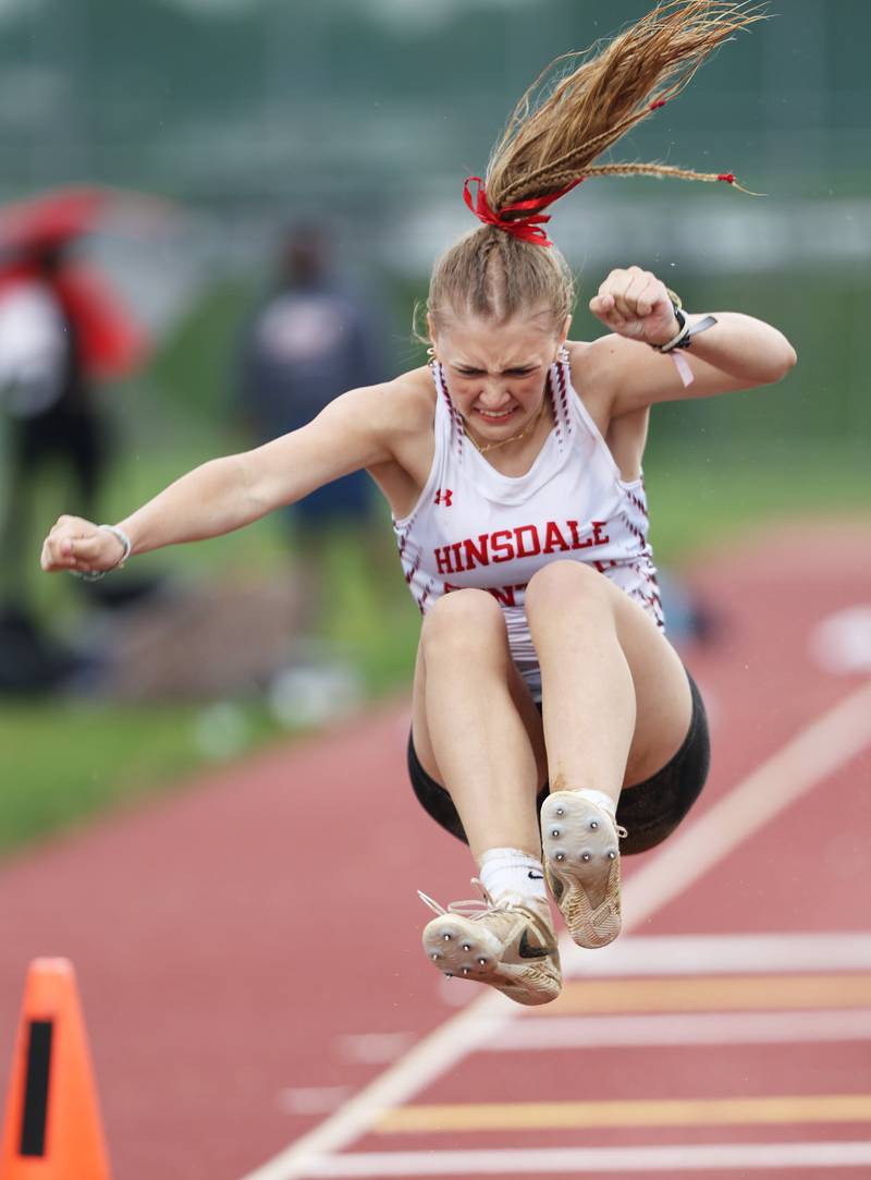 Hinsdale Central's Avery Bonino gets ready to land in the long jump during the girls varsity track and field 3A Lockport sectional on Friday, May 12, 2023.