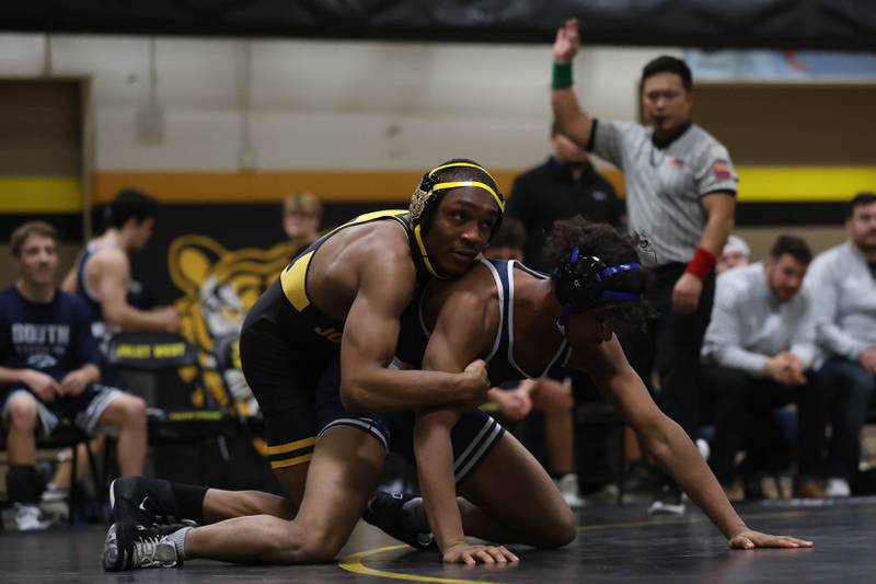 Joliet West’s Aiden Brown works over Plainfield South’s Julius Pierscionek in the 175 pound match on Wednesday, Dec. 3, 2025 in Joliet.
