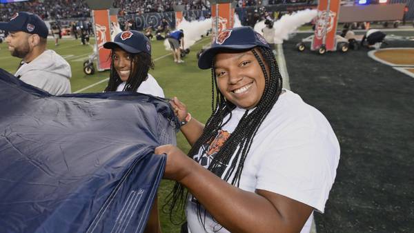 Cancer survivor unfurls Bear Down flag at Chicago Bears home opener
