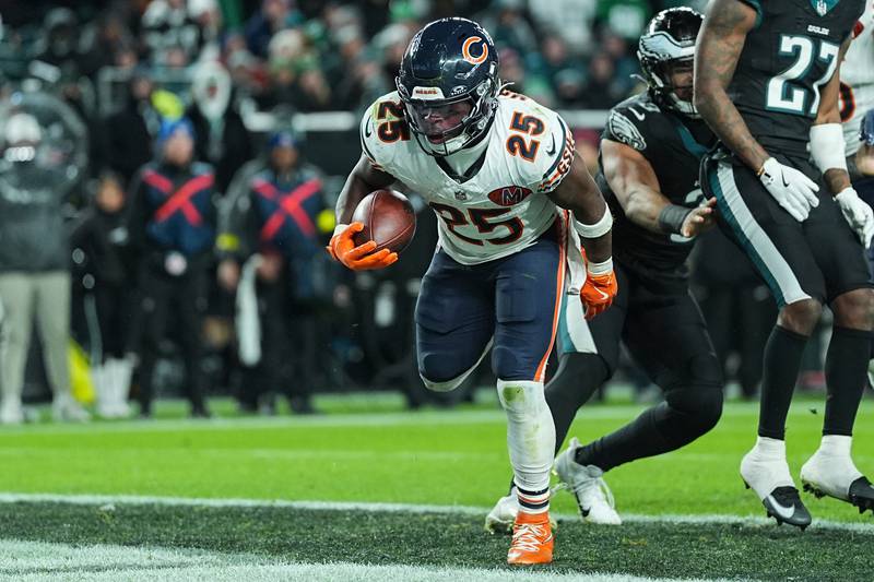 Chicago Bears running back Kyle Monangai (25) scores a touchdown during the second half of an NFL football game against the Philadelphia Eagles, Friday, Nov. 28, 2025, in Philadelphia. (AP Photo/Matt Rourke)