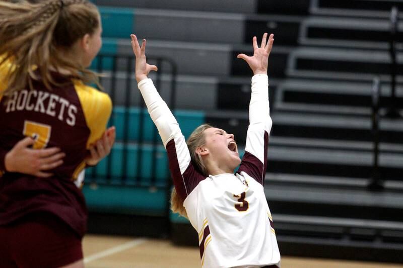 Richmond-Burton’s Lanie Cooley shouts for joy after a point in varsity volleyball at Woodstock North Monday night.
