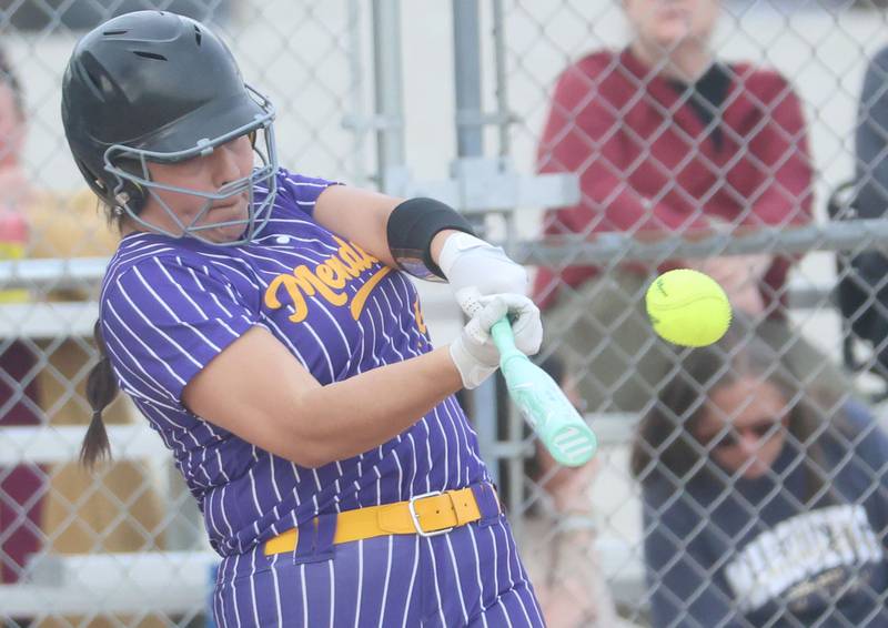 Mendota's Lexie Saylor lets go of a pitch to Marquette on Wednesday, March 25, 2026 at June Gross Field in Ottawa.