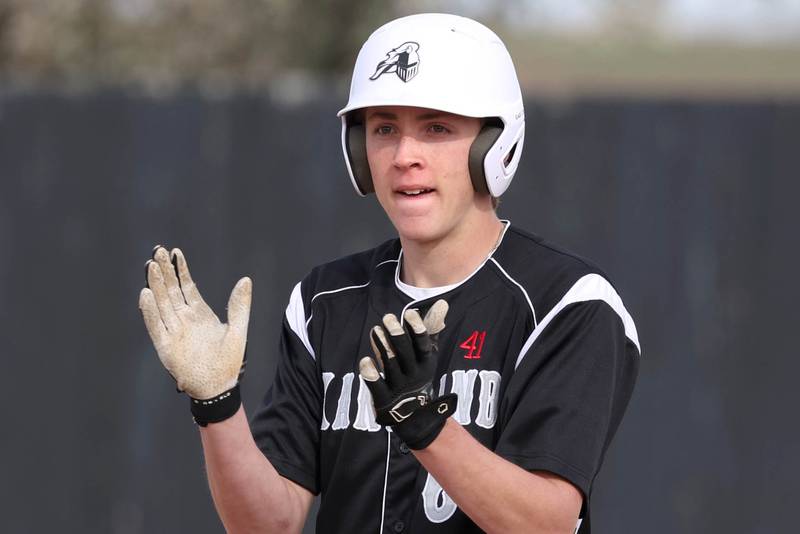 Kaneland's Dylan Borysiewicz applauds at second after he hit an RBI double during their game against Sycamore Monday, April 22, 2024, at the Sycamore Community Sports Complex.
