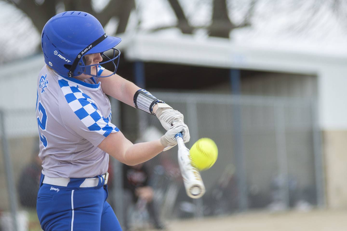 Newman's Carlin Brady connects with a pitch against Hall Tuesday, April 19, 2022.