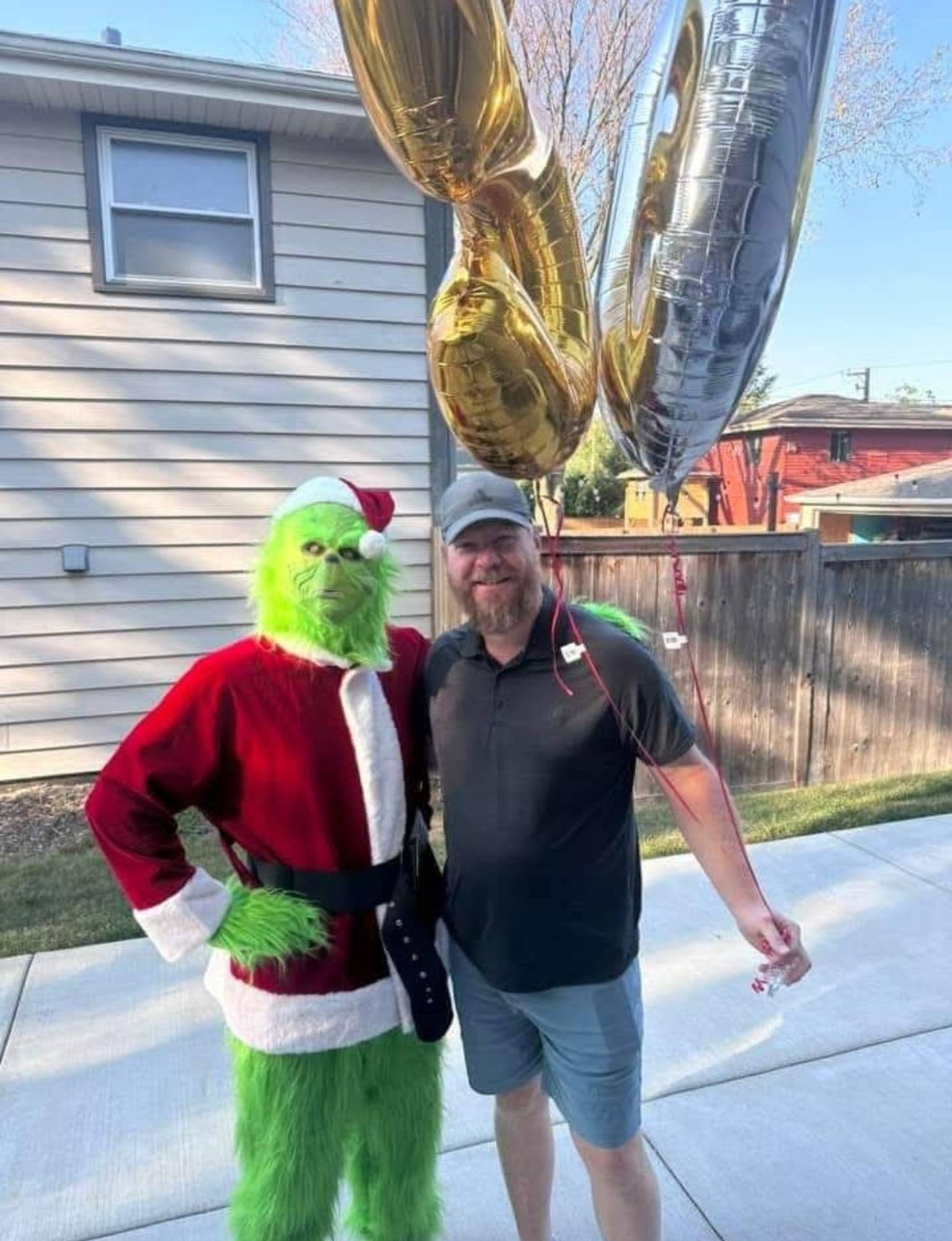 Downers Grove North High School senior Nathaniel Haubold will spend of the holiday season entertaining folks at parties and get togethers as the Grinch