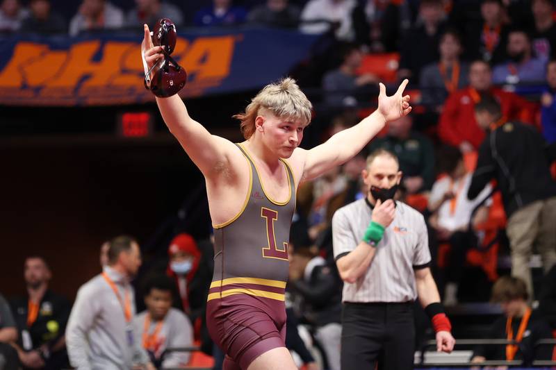Lockport’s Andrew Blackburn-Forst celebrates a 24 second fall against Hinsdale Central’s Marko Invanisevic for the Class 3A 220lb. semifinals at State Farm Center in Champaign. Friday, Feb. 18, 2022, in Champaign.