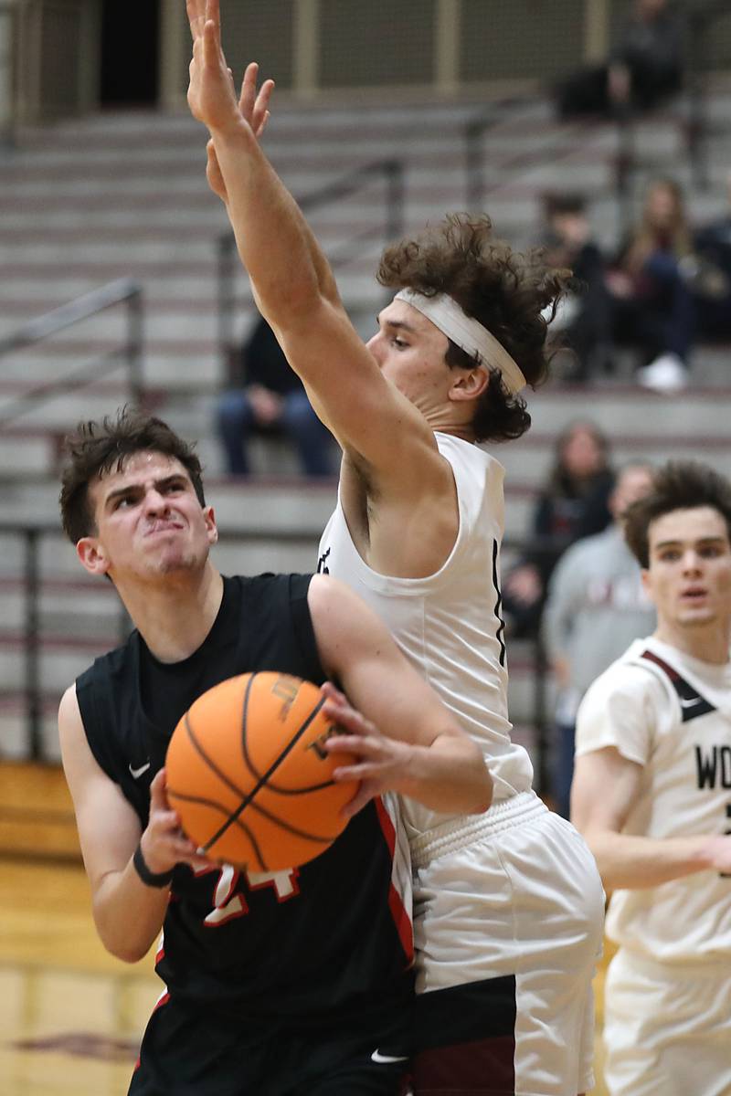 Huntley's Casey Kaczmarski drives to the basket against Prairie Ridge's Luke Vanderwiel during a Fox Valley Conference boys basketball game on Wednesday, Jan. 21, 2026, at Prairie Ridge High School in Crystal Lake.