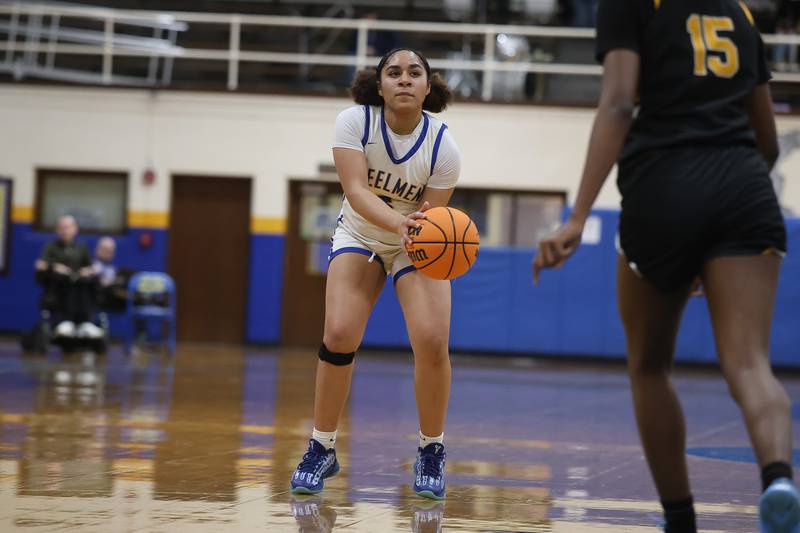 Joliet Central’s Melani Tua-Link lines up a deep shot against Joliet West on Thursday, Jan. 15, 2026 in Joliet.