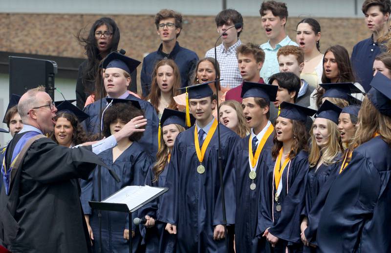 A Capella singers perform during graduation at Cary-Grove High School in Cary on Saturday, May 17, 2025.