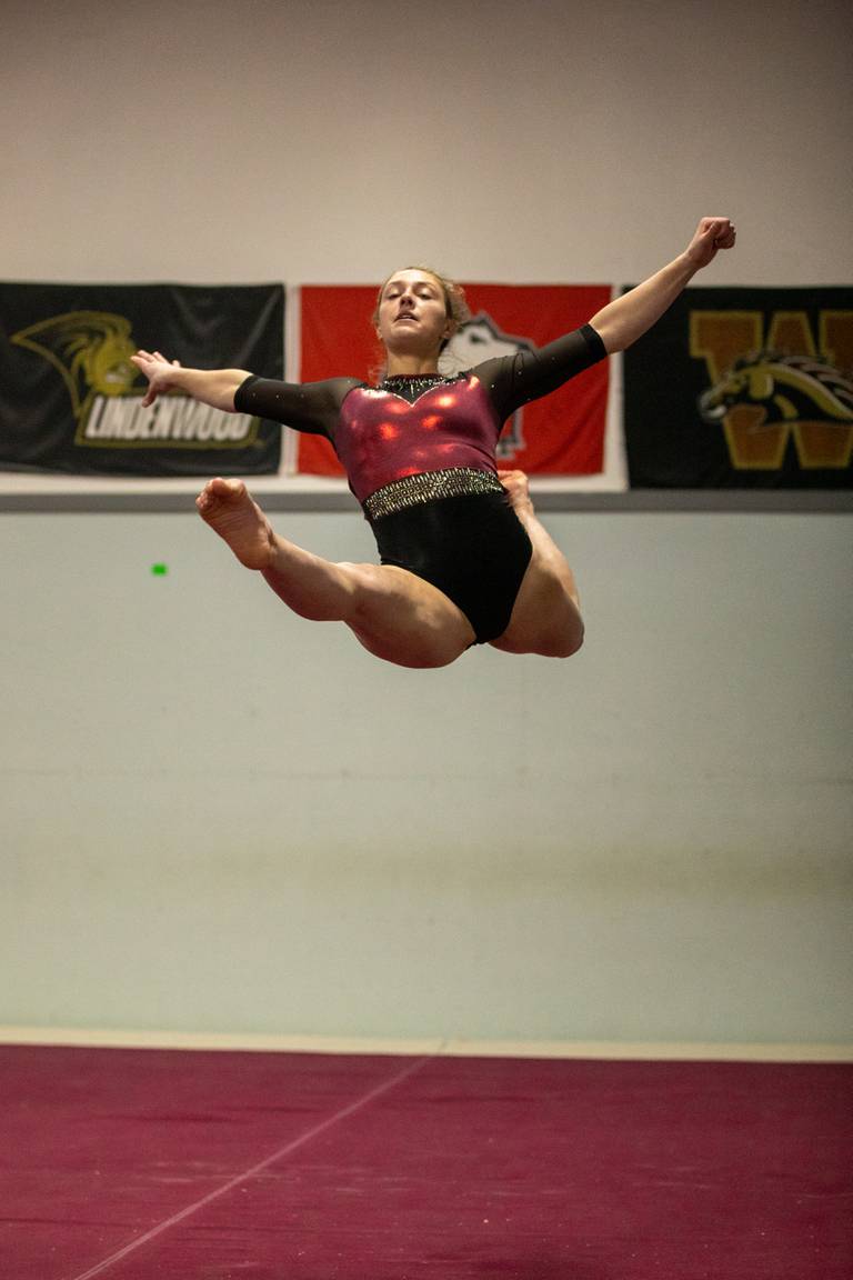 Prairie Ridge gymnast Gabby Riley competes in floor exercise. Riley was the all-around champion at the 2020 IHSA Girls Gymnastics State Meet.