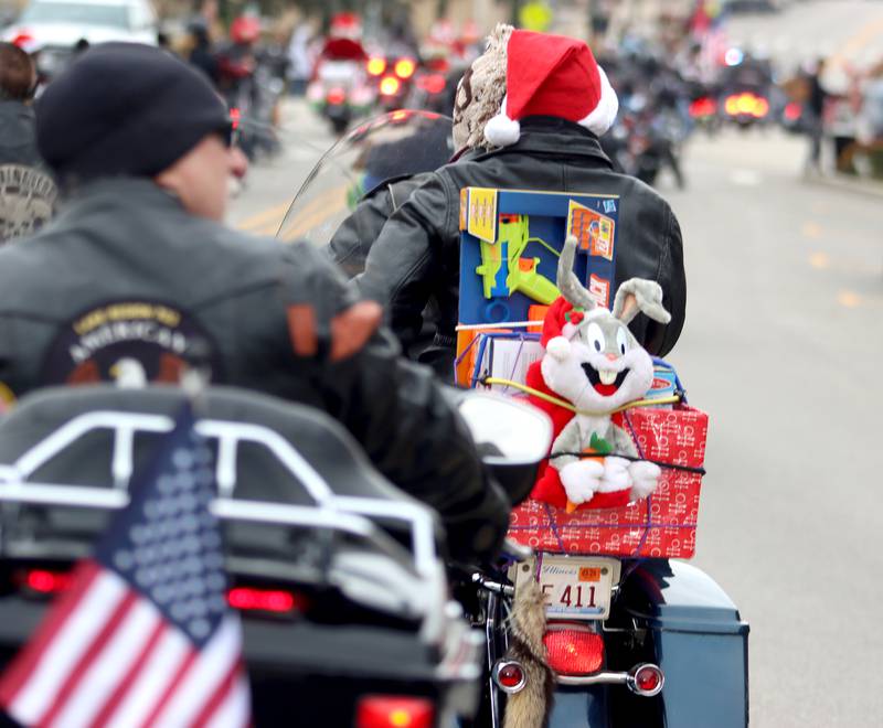 Motorcyclists cruise during the Toys for Tots Parade on Sunday, Nov. 24, 2024, in downtown McHenry.