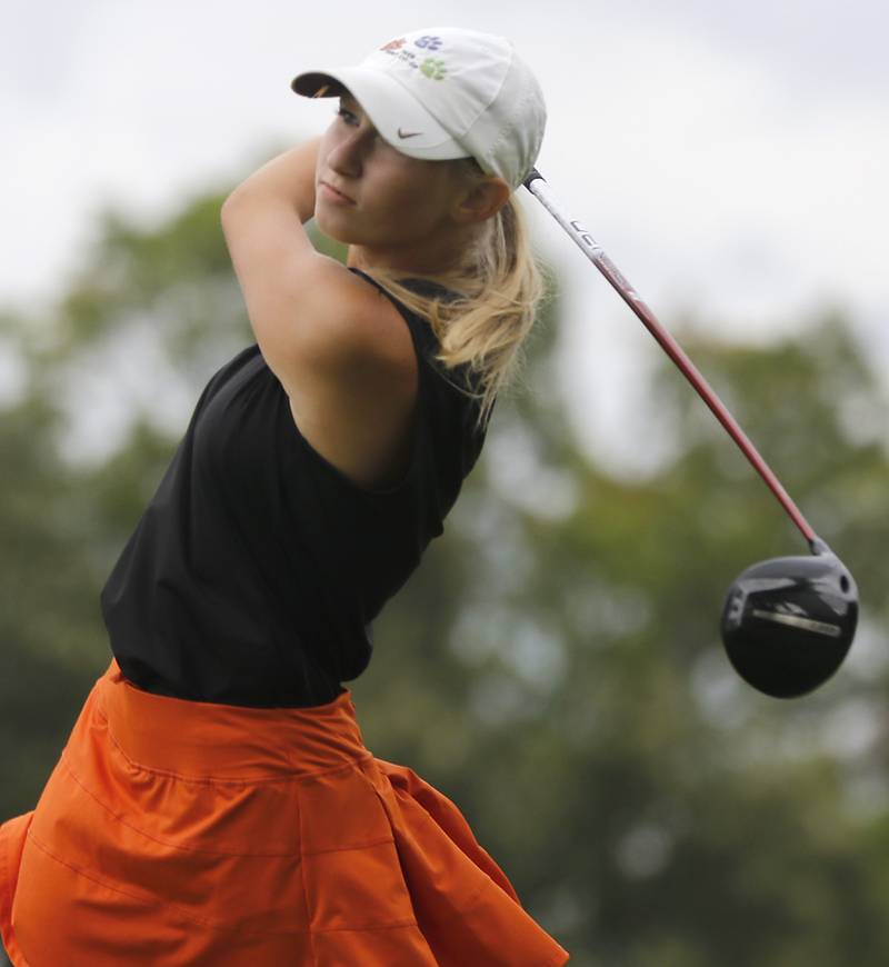 Crystal Lake Central co-op’s Rylee Rud watches her tee shot on the 14th hole during the Fox Valley Conference Girls Golf Tournament Wednesday, Sept. 24, 2025, at Crystal Woods Golf Club in Woodstock.