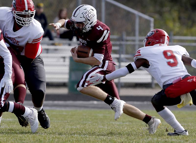 Prairie Ridge's Jack Finn breaks away from Chicago Goode's Aedan Cleveland during an IHSA Class 5A first-round football game on Saturday, Nov. 2, 2024, at Prairie Ridge High School in Crystal Lake.