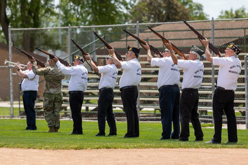 The Peru Honor Guard performs 21-Gun Salute at the annual Memorial Day service on Monday, May 26, 2025 at Washington Park in Peru.